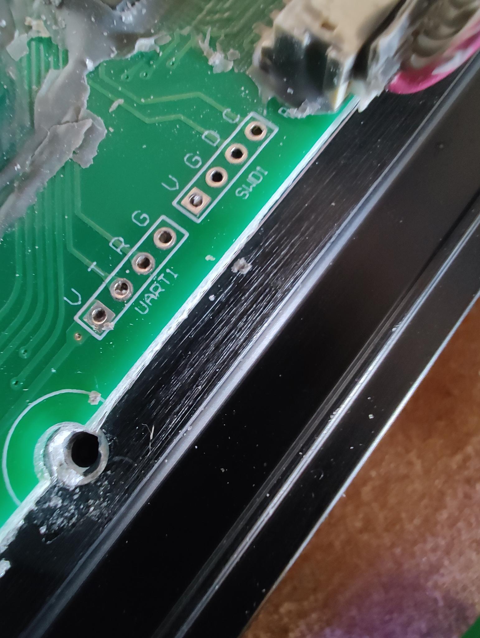 UART1 and SWD1 debug headers, close up